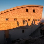 Traunsteinhaus bei Sonnenuntergang Schatten der Bergsteiger